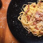 “La Carbonara e il Parmigiano sono Americani.” Le strane dichiarazioni del Professore di storia dell'alimentazione all'Università di Parma